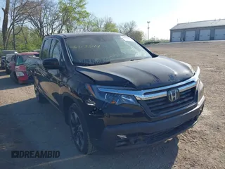 2020 Honda Ridgeline RTL with VIN 5FPYK3F52LB024816, listed as a IAAI auction lot 42103344 with 68,700 mi miles and . Bid and sale history available at DreamBid. Image 1.