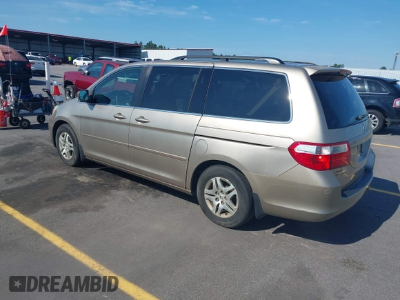 2005 Honda Odyssey EX-L z VIN 5FNRL38735B111376, wystawiony jako IAAI lot #42378824 z przebiegiem 191 632 mil mil oraz . Historia ofert i sprzedaży dostępna na DreamBid. Obrazek 3.