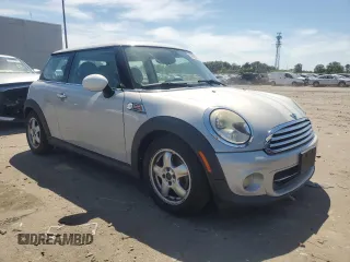 2011 MINI Hardtop with VIN WMWSU3C5XBTX96048, listed as a Copart auction lot 57607955 with 99,632 mi miles and Salvage title. Bid and sale history available at DreamBid. Image 4.