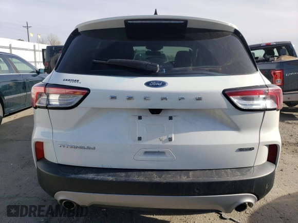 2020 Ford Escape Titanium Hybrid z VIN 1FMCU9DZXLUC07311, wystawiony jako Copart lot #48085815 z przebiegiem 50 472 mil mil oraz Szkoda całkowita • Salvage title. Historia ofert i sprzedaży dostępna na DreamBid. Obrazek 6.