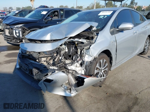 2022 Toyota Prius LE with VIN JTDKAMFP3N3209448, listed as a IAAI auction lot 40533784 with 116,436 mi miles and . Bid and sale history available at DreamBid. Image 6.