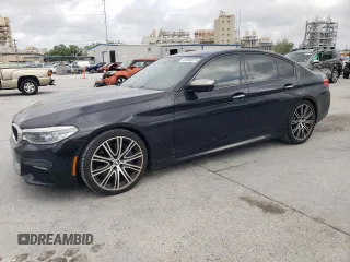 2018 BMW 5 Series M550i xDrive with VIN WBAJB9C57JB034918, listed as a Copart auction lot 51668675 with 94,492 mi miles and Clean Title. Bid and sale history available at carsss.com. Image 1.