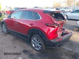 2022 Mazda CX-30 S Carbon Edition с VIN 3MVDMBCL4NM431242, выставлен на аукционе IAAI как лот 41851636 с пробегом 40 982 миль миль и . История ставок и продаж доступна на DreamBid. Изображение 3.