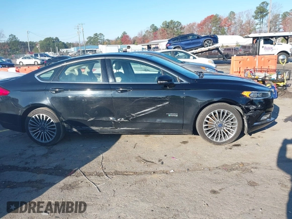 2017 Ford Fusion Titanium with VIN 3FA6P0SU2HR309895, listed as a IAAI auction lot 40963527 with 80,761 mi miles and . Bid and sale history available at DreamBid. Image 13.