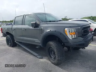 2021 Ford F-150 XL with VIN 1FTFW1EDXMFC59379, listed as a IAAI auction lot 42326735 with 37,188 mi miles and . Bid and sale history available at DreamBid. Image 1.