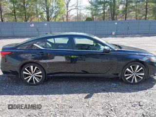 2021 Nissan Altima SR with VIN 1N4BL4CV6MN369815, listed as a IAAI auction lot 41878884 with 60,629 mi miles and . Bid and sale history available at carsss.com. Image 13.