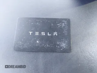2022 Tesla Model 3 with VIN 5YJ3E1EA2NF245817, listed as a IAAI auction lot 41976493 with 32,710 mi miles and . Bid and sale history available at DreamBid. Image 11.