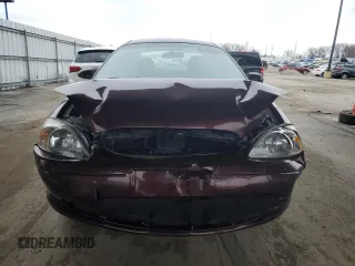 2000 Ford Taurus SE with VIN 1FAFP53U1YG262412, listed as a Copart auction lot 50383705 with 166,541 mi miles and Salvage Title. Bid and sale history available at DreamBid. Image 5.