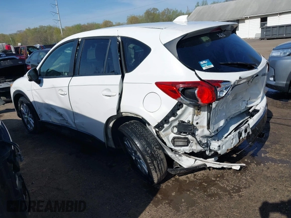 2014 Mazda CX-5 Touring with VIN JM3KE2CY5E0329783, listed as a IAAI auction lot 42017473 with 121,175 mi miles. Bid and sale history available at carsss.com. Image 3.