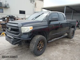 2014 Toyota Tundra 4WD Truck SR with VIN 5TFUM5F14EX051843, listed as a IAAI auction lot 41773983 with 145,089 mi miles. Bid and sale history available at carsss.com. Image 2.