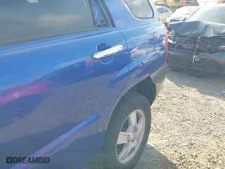 2007 Kia Sportage LX with VIN KNDJF724277382562, listed as a IAAI auction lot 42047497 with 144,079 mi miles. Bid and sale history available at carsss.com. Image 6.