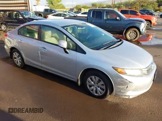 2012 Honda Civic LX z VIN 2HGFB2F56CH583694, wystawiony jako IAAI lot #41579811 z przebiegiem 179 783 mil mil oraz . Historia ofert i sprzedaży dostępna na DreamBid. Obrazek 1.