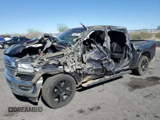 2020 Ram 1500 Laramie with VIN 1C6RREJT5LN139087, listed as a Copart auction lot 56407905 with 122,899 mi miles and Salvage title. Bid and sale history available at DreamBid. Image 1.
