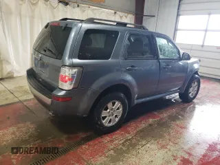 2010 Mercury Mariner z VIN 4M2CN9B70AKJ24170, wystawiony jako Copart lot #49241535 z przebiegiem 118 661 mil mil oraz Szkody całkowita. Historia ofert i sprzedaży dostępna na DreamBid. Obrazek 3.