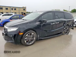 2021 Honda Odyssey Elite with VIN 5FNRL6H97MB006311, listed as a Copart auction lot 60653115 with 64,831 mi miles and Salvage title. Bid and sale history available at DreamBid. Image 1.