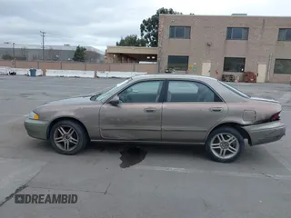 1999 Mazda 626 ES with VIN 1YVGF22C8X5900510, listed as a IAAI auction lot 41479213 with 178,182 mi miles. Bid and sale history available at carsss.com. Image 14.