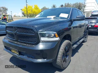 2014 Ram 1500 Express with VIN 3C6RR6KT7EG221631, listed as a IAAI auction lot 42397832 with 98,715 mi miles and . Bid and sale history available at DreamBid. Image 2.