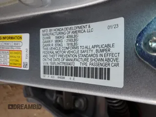 2023 Honda Civic EX-L z VIN 19XFL1H77PE004072, wystawiony jako Copart lot #49524855 z przebiegiem 21 100 mil mil oraz Szkoda całkowita • Salvage title. Historia ofert i sprzedaży dostępna na DreamBid. Obrazek 14.