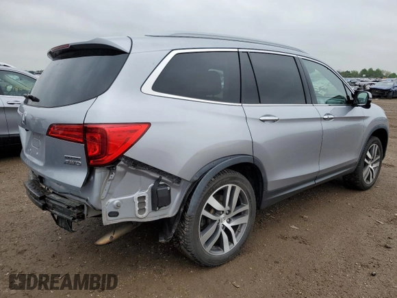 2018 Honda Pilot Touring z VIN 5FNYF6H94JB039992, wystawiony jako Copart lot #57128435 z przebiegiem 85 578 mil mil oraz Szkoda całkowita • Salvage title. Historia ofert i sprzedaży dostępna na DreamBid. Obrazek 3.