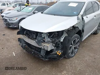2016 Lexus RX 450h with VIN 2T2BGMCA6GC002928, listed as a IAAI auction lot 41566359 with 98,437 mi miles and . Bid and sale history available at DreamBid. Image 6.