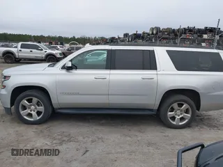 2018 Chevrolet Suburban LT z VIN 1GNSCHKC1JR394991, wystawiony jako IAAI lot #41192222 z przebiegiem 90 313 mil mil oraz . Historia ofert i sprzedaży dostępna na DreamBid. Obrazek 15.