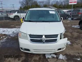 2010 Dodge Grand Caravan SXT with VIN 2D4RN5D18AR218903, listed as a IAAI auction lot 41560484 with Not Provided miles and . Bid and sale history available at DreamBid. Image 12.