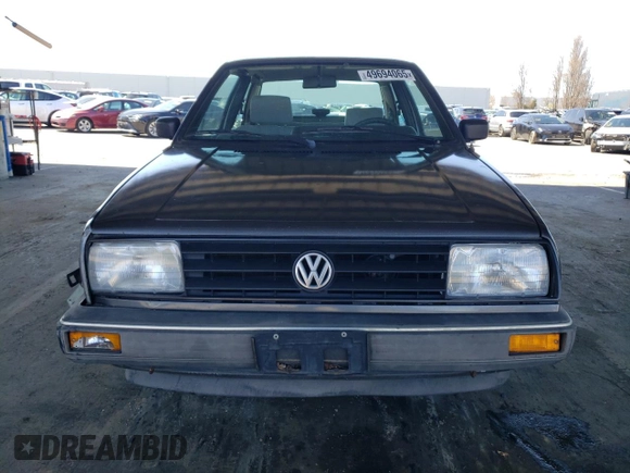 1989 Volkswagen Jetta z VIN WVWKB01G2KW684385, wystawiony jako Copart lot #49694065 z przebiegiem 63 792 mil mil oraz Czysty tytuł • Clean title. Historia ofert i sprzedaży dostępna na DreamBid. Obrazek 5.