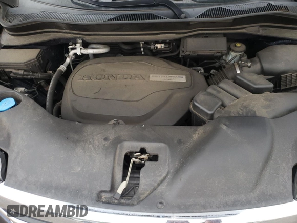 2016 Honda Pilot EX-L z VIN 5FNYF6H7XGB089688, wystawiony jako Copart lot #57041485 z przebiegiem 92 544 mil mil oraz Szkoda całkowita • Salvage title. Historia ofert i sprzedaży dostępna na DreamBid. Obrazek 12.