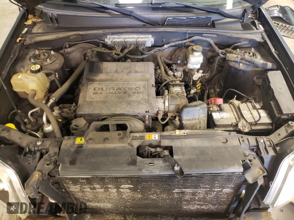 2009 Mercury Mariner Premier with VIN 4M2CU97G29KJ23254, listed as a Copart auction lot 56557305 with 201,739 mi miles and Non repairable. Bid and sale history available at DreamBid. Image 11.