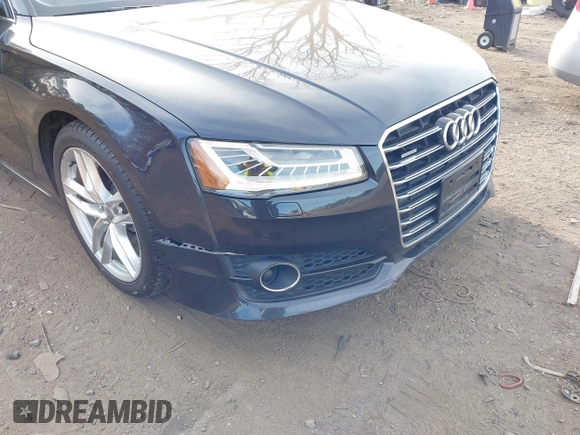 2017 Audi A8 L with VIN WAU44AFDXHN006857, listed as a IAAI auction lot 41758062 with 88,385 mi miles. Bid and sale history available at carsss.com. Image 6.
