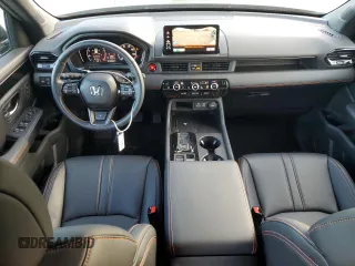 2023 Honda Pilot TrailSport with VIN 5FNYG1H63PB017335, listed as a Copart auction lot 75012154 with 5,870 mi miles and Salvage Title. Bid and sale history available at carsss.com. Image 8.