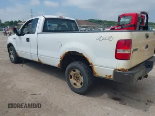 2005 Ford F-150 XL with VIN 1FTRF14W25NA18309, listed as a IAAI auction lot 42694465 with 242,618 mi miles and . Bid and sale history available at DreamBid. Image 3.