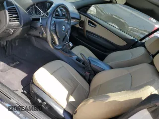 2008 BMW 1 Series 128i with VIN WBAUN13508VH77566, listed as a Copart auction lot 49605155 with 66,885 mi miles and Salvage Title. Bid and sale history available at DreamBid. Image 7.