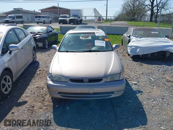 1998 Toyota Corolla VE z VIN 2T1BR18E2WC019524, wystawiony jako IAAI lot #41997009 z przebiegiem 255 968 mil mil oraz . Historia ofert i sprzedaży dostępna na DreamBid. Obrazek 6.