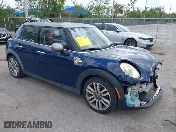 2017 MINI Hardtop 4 Door Cooper with VIN WMWXU1C54H2E19114, listed as a IAAI auction lot 42107266 with 83,524 mi miles and . Bid and sale history available at DreamBid. Image 1.
