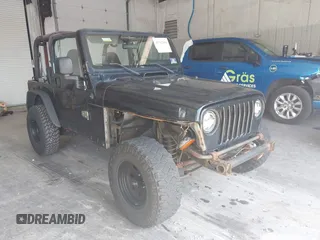 1999 Jeep Wrangler Sport with VIN 1J4FY19S4XP494405, listed as a IAAI auction lot 42542416 with 168,856 mi miles and . Bid and sale history available at DreamBid. Image 1.