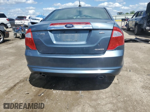2012 Ford Fusion SEL z VIN 3FAHP0JG7CR297174, wystawiony jako Copart lot #55469005 z przebiegiem 129 434 mil mil oraz Szkoda całkowita • Salvage title. Historia ofert i sprzedaży dostępna na DreamBid. Obrazek 6.