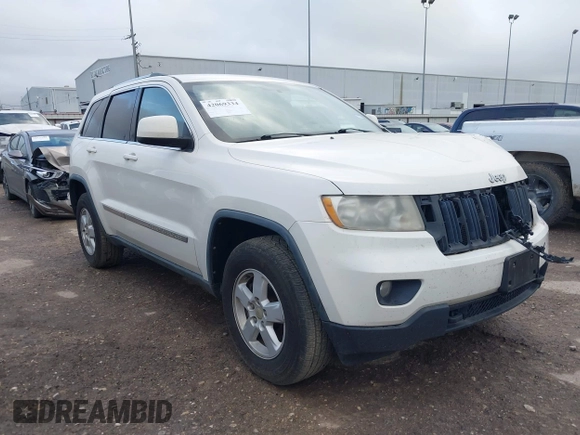 2012 Jeep Grand Cherokee Laredo with VIN 1C4RJFAG5CC224032, listed as a IAAI auction lot 42069334 with 106,614 mi miles. Bid and sale history available at carsss.com. Image 1.