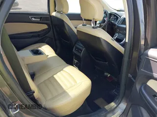 2016 Ford Edge SEL z VIN 2FMPK4J87GBC61845, wystawiony jako IAAI lot #42017547 z przebiegiem 90 710 mil mil oraz . Historia ofert i sprzedaży dostępna na DreamBid. Obrazek 8.
