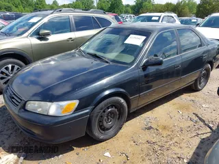 2000 Toyota Camry CE z VIN 4T1BG22K1YU663544, wystawiony jako IAAI lot #42252413 z przebiegiem 338 875 mil mil oraz . Historia ofert i sprzedaży dostępna na DreamBid. Obrazek 2.