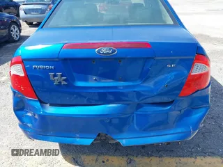 2012 Ford Fusion SE z VIN 3FAHP0HA0CR129328, wystawiony jako IAAI lot #41071631 z przebiegiem 174 913 mil mil oraz . Historia ofert i sprzedaży dostępna na DreamBid. Obrazek 6.