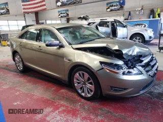 2012 Ford Taurus Limited with VIN 1FAHP2JW3CG142762, listed as a Copart auction lot 77864584 with 131,911 mi miles and Salvage title. Bid and sale history available at DreamBid. Image 4.