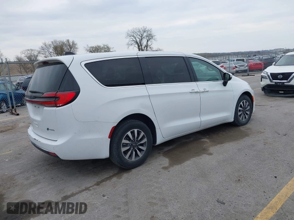 2023 Chrysler Pacifica Hybrid Touring L z VIN 2C4RC1L74PR540870, wystawiony jako IAAI lot #42056528 z przebiegiem 46 940 mil mil oraz . Historia ofert i sprzedaży dostępna na DreamBid. Obrazek 4.
