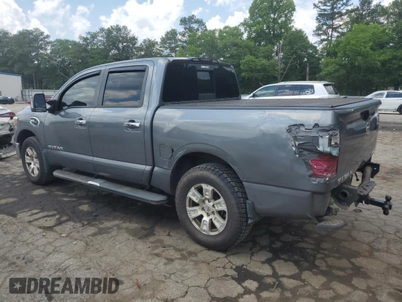 2017 Nissan Titan Platinum Reserve z VIN 1N6AA1E56HN571502, wystawiony jako Copart lot #56751155 z przebiegiem 105 017 mil mil oraz Szkoda całkowita • Salvage title. Historia ofert i sprzedaży dostępna na DreamBid. Obrazek 2.