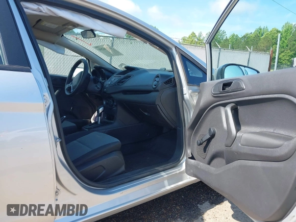 2016 Ford Fiesta S z VIN 3FADP4AJ6GM123343, wystawiony jako IAAI lot #42136294 z przebiegiem 100 206 mil mil oraz . Historia ofert i sprzedaży dostępna na DreamBid. Obrazek 5.