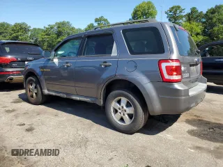 2009 Ford Escape XLS with VIN 1FMCU02749KA36136, listed as a Copart auction lot 64941875 with 171,576 mi miles and Clean title. Bid and sale history available at DreamBid. Image 2.