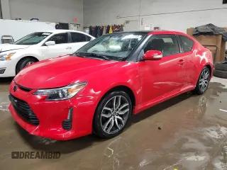2014 Scion tC z VIN JTKJF5C71E3072025, wystawiony jako Copart lot #51967285 z przebiegiem 187 091 mil mil oraz Szkody całkowita. Historia ofert i sprzedaży dostępna na DreamBid. Obrazek 1.
