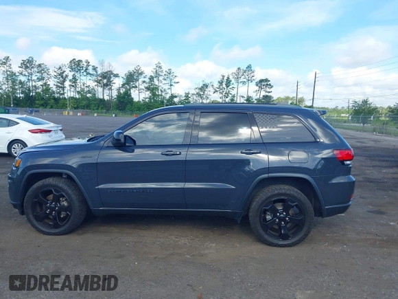 2018 Jeep Grand Cherokee Altitude with VIN 1C4RJFAG7JC394051, listed as a IAAI auction lot 42492771 with 147,669 mi miles and . Bid and sale history available at DreamBid. Image 14.