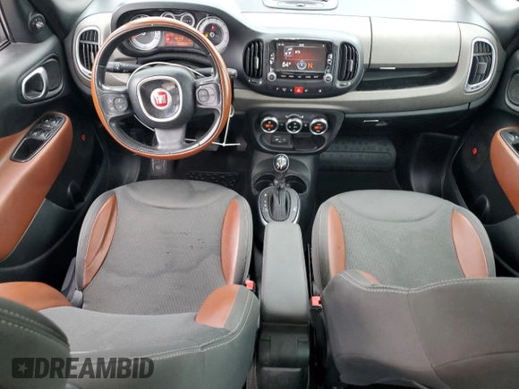 2014 FIAT 500L Trekking with VIN ZFBCFADH1EZ007143, listed as a Copart auction lot 52030065 with 90,894 mi miles and Salvage title. Bid and sale history available at DreamBid. Image 8.