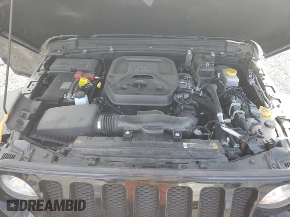 2023 Jeep Wrangler Sport with VIN 1C4HJXDN7PW530536, listed as a Copart auction lot 69664634 with 16,816 mi miles and Salvage Title. Bid and sale history available at DreamBid. Image 12.